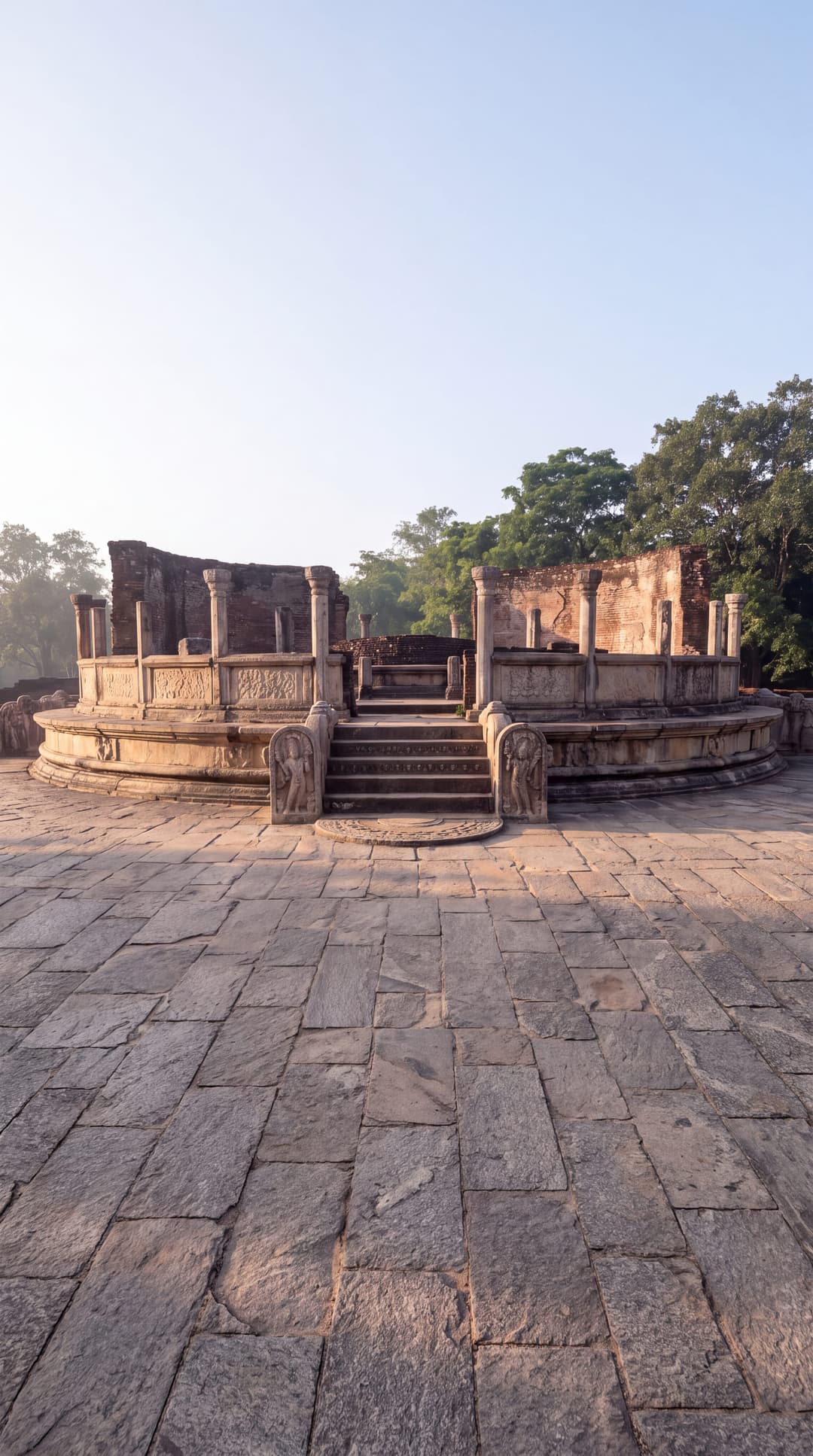 The ancient stone quadrangle at Polonnaruwa at first light, deserted